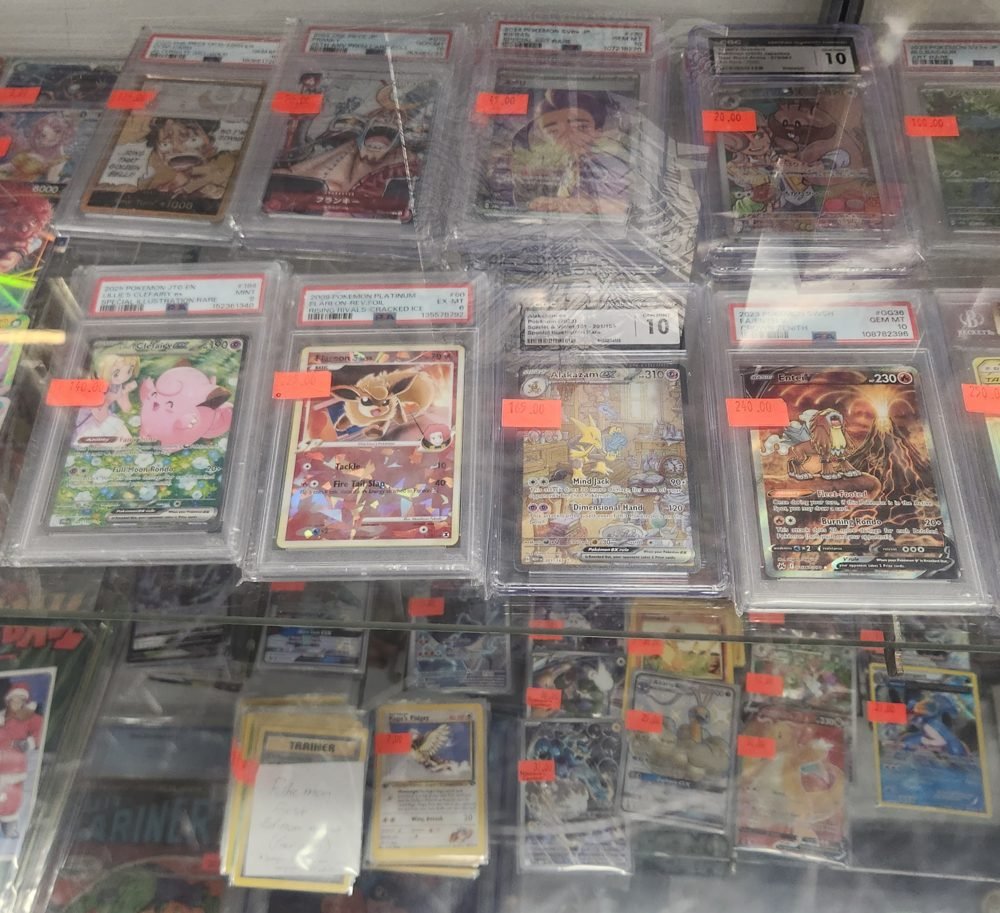 Trading card game singles and slabs in the case